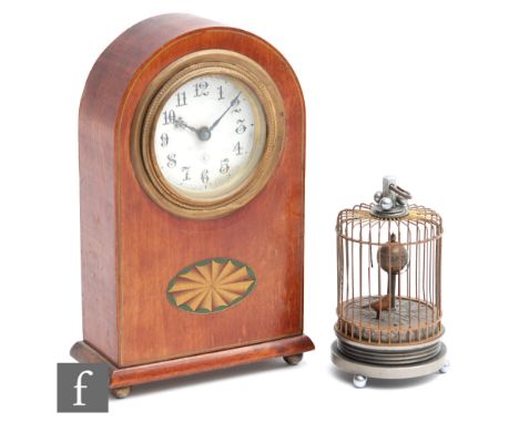 An early 20th Century novelty birdcage clock automaton, unnamed, height 13cm and width 7.5cm, together with an American arche