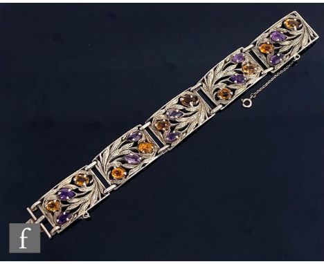 A 20th Century silver hinged five panel bracelet each set with amethyst and citrene to a foliate ground, weight 46.5g, length
