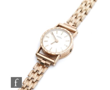 A 9ct hallmarked lady's Roamer wrist watch, batons to a circular dial to a 9ct gate link bracelet, total weight 11.5g, S/D. 