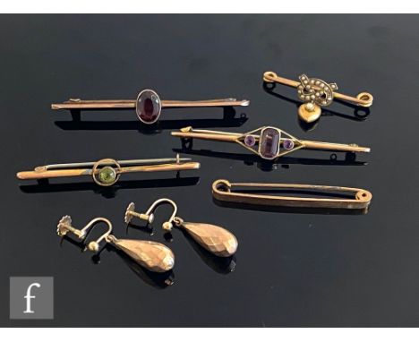 Five assorted early 20th Century 9ct bar brooches to include a three stone amethyst example, with a pair of 9ct drop earrings