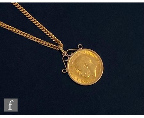 A George V half sovereign dated 1913, loose set to a 9ct pendant mount and suspended from a 9ct curb chain, total weight 12.5