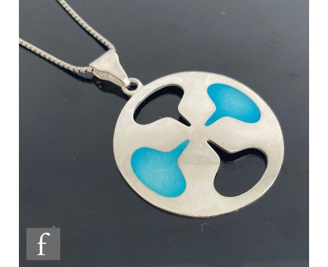 A 1960s Sterling silver necklace attributed in design to&nbsp;Ib Bluitgen, the circular pendant with blue enamel and cut out 