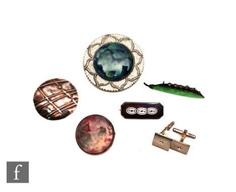 Two Ruskin Pottery brooches together with two enamel brooches, a modernist silver brooch and a pair of cufflinks. (6) 