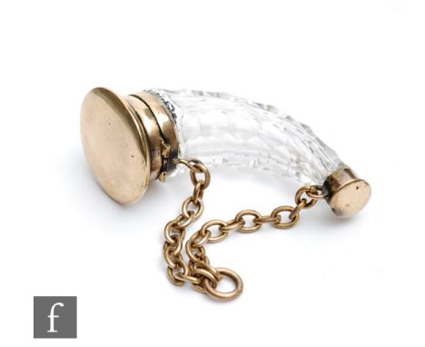A 19th Century brass and clear glass cornucopia scent bottle in hanging chain, length 7cm, S/D. 