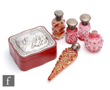 A Victorian hallmarked silver topped ruby flash cut torpedo scent bottle, length 13cm, London 1884, with a similar rectangula