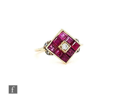 A mid 20th Century ruby and diamond cluster ring, square head with a central diamond within a border of eight rubies and twin