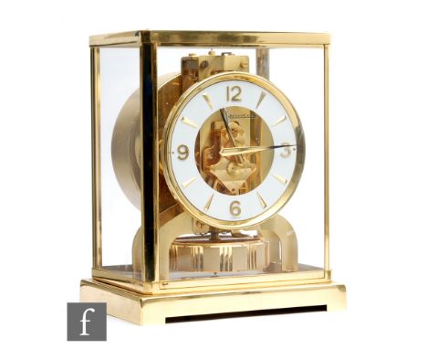 A Jaeger-LeCoultre Atmos clock, the white chapter ring with Arabic and baton numerals, serial number 391292, in a polished la
