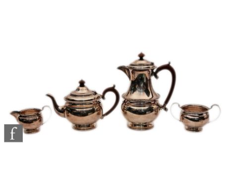 A hallmarked silver teapot of plain bulbous form with egg and dart borders, weight 15oz,&nbsp; Birmingham 1931,&nbsp;Charles 