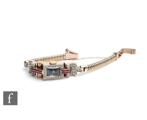 An Art Deco 14ct diamond and ruby set lady's Zenith cocktail watch, gilt batons to a black dial within a diamond set border, 