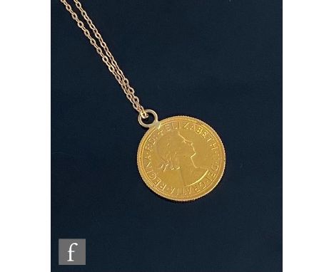 An Elizabeth II full sovereign dated 1968 with soldered pendant loop and suspended from a fine trace chain, total weight 9.5g