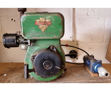 A Clinton Engines stationary engine, model A2190 2132, Serial number 8553548E. 