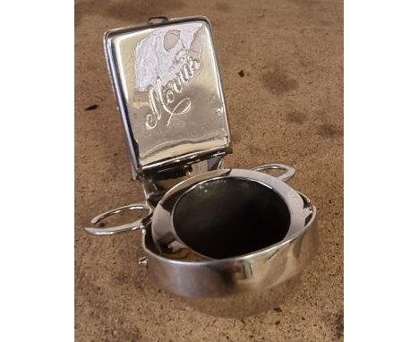 A rare vintage Wilmot Manufacturing Co. Ltd dash mounted electroplated smokers compendium, comprising match case, inscribed M
