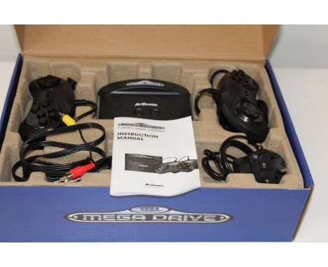 A boxed Sega classic game console (untested) 