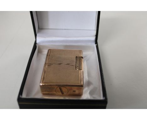 A vintage Dupont gold plated lighter 