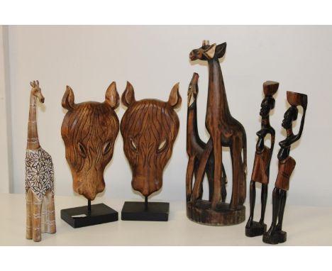 An assortment of carved figures etc 