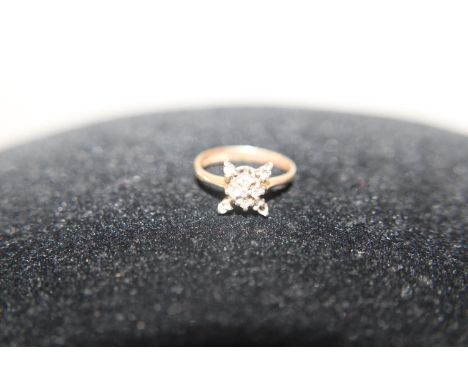 A 9ct gold diamond cluster ring (one stone missing) 