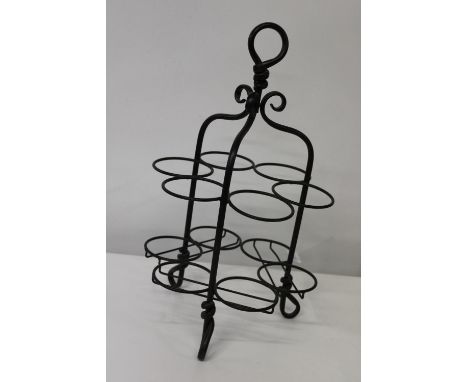 A vintage style metal wine bottle rack 