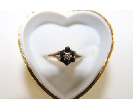 A 9ct gold diamond &amp; sapphire cluster ring size O 