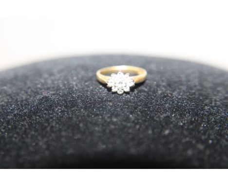 A 18ct gold &amp; diamond cluster ring (approx 1ct of diamonds) 