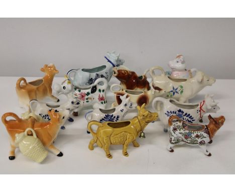 A job lot of ceramic creamer jugs 