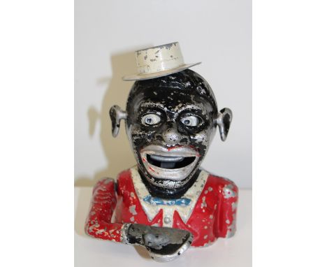 A vintage jolly man money box 
