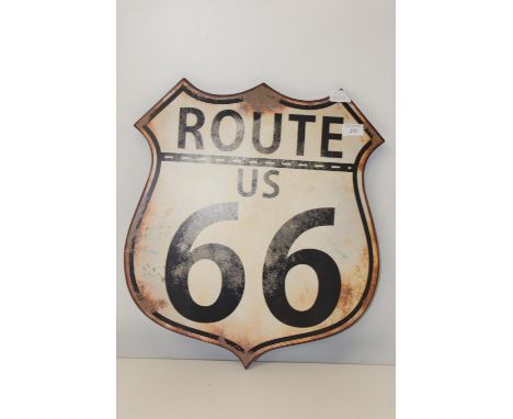 A vintage style metal wall sign 
