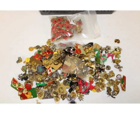 A large quantity of assorted enamel pin  badges etc 