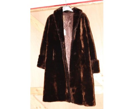 A faux fur Ladies coat. postage uk only 