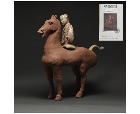 Ca. 202 BC-220 AD. Chinese Han Dynasty. Terracotta Horse with Rider. An elegant hollow-moulded terracotta horse. This brown h