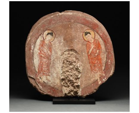 300 – 500 AD. Gandharan stucco halo. This discoid halo would originally have been part of a large Gandharan statue. In its pr