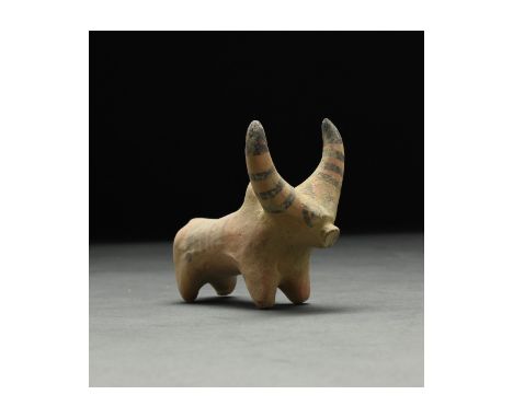 C. 2nd millennium BC. Ancient Central Asia, Indus Valley. 2nd millennium BC. An ochre-coloured ceramic figurine of a zebu wit