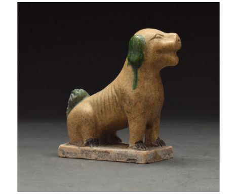 Ca. 1368-1644 AD. Chinese Ming Dynasty Ceramic Figure. A beautifully crafted ochre-coloured glazed terracotta dog. The dog is