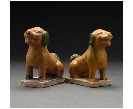 Ca. 1368-1644 AD. Chinese Ming Dynasty Ceramic Figures. Two beautifully crafted ochre-coloured glazed terracotta dogs. The do