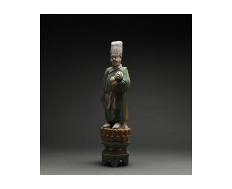 Ca. 1368-1644 AD. Chinese Ming Dynasty Attendant Figure. A large and elaborately crafted male attendant figure dressed in a d
