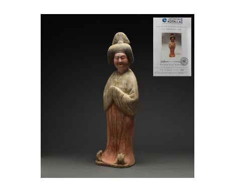 Ca. 618-907 AD. Chinese Tang Dynasty Ceramic ‘Fat Lady’ Figure. The figure stands facing forward, with head slightly inclined