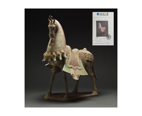 Ca. 386-534 AD. Chinese Northern Wei Dynasty. Terracotta Horse. A heavily restored, elegant hollow-moulded terracotta horse. 