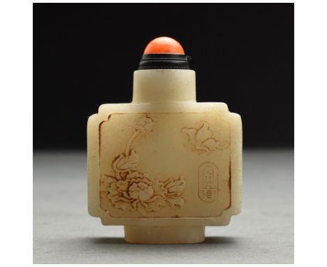 A white jade snuff bottle with reserves of butterfly and flower and inscriptions, China, Qing Dynasty, late 19th century Size