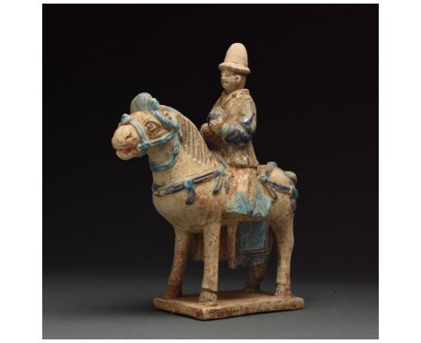 Ca. 1368-1644 AD. Ming Dynasty. White horse in standing position with neck and head extended slightly forward and mouth agape