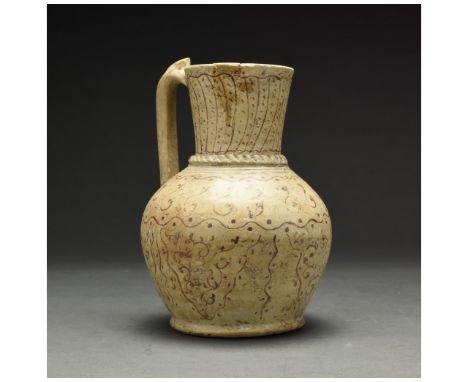 Ca. 1000 AD. Beautiful Medieval Persian terracotta jug in a cream fabric with brown painted geometric decoration. The flat-bo