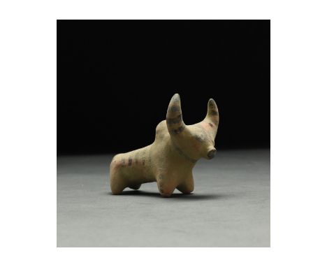 C. 2nd millennium BC. Ancient Central Asia, Indus Valley. 2nd millennium BC. An ochre-coloured ceramic figurine of a zebu wit