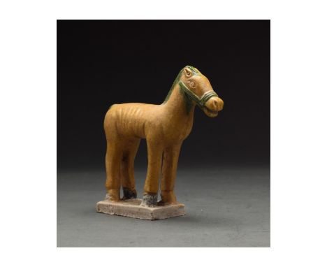 Ca. 1368-1644 AD. Chinese Ming Dynasty Ceramic Figure. A beautifully crafted ochre-coloured glazed terracotta ceramic figure 