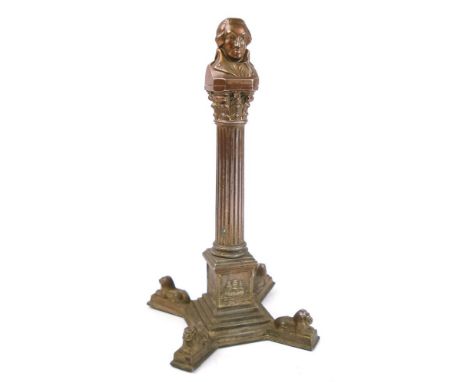 An early 20th century anodised table lighter in the form of Nelson's column:, 28cm high.