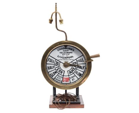 A bulkhead engine room telegraph by Chadburn's (Ship)Telegraph Company, Ltd, Liverpool:, the 12 inch white enamel dial signed