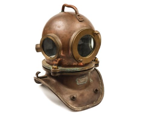 A Russian 3-bolt diving helmet, date stamped 1946:, riveted handle to top over circular observation windows, rear outlet with