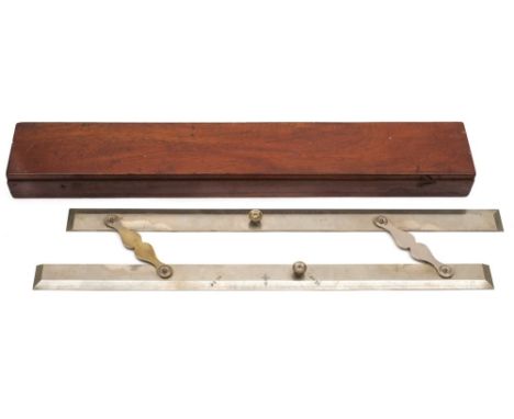A polished steel parallel rule in mahogany case:, of traditional form with moustache hinges, calibrated top rule and compass 