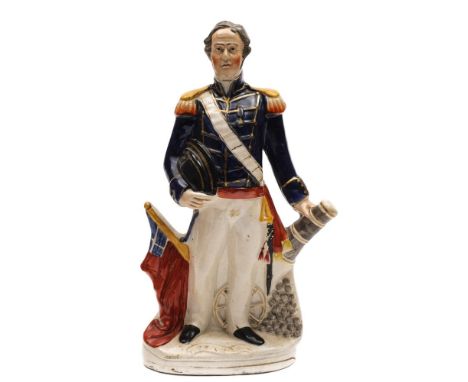 A Staffordshire pottery portrait figure of Admiral Sir Deans Dundas: modelled standing in naval uniform, hat under one arm, h