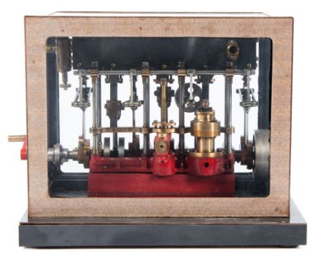 A well engineered scale model of the Stuart Triple expansion Marine engine:, conterbalanced drive shaft with heavy flywheel ,