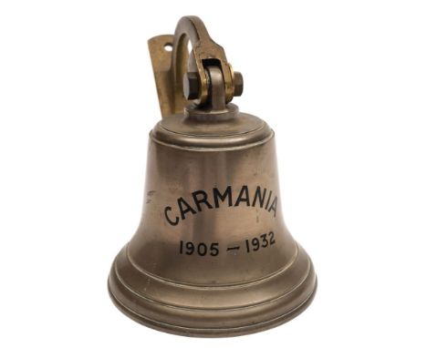 A commemorative brass ship's bell for the Cunard Liner RMS Carmania 1905-1932:, the bell inscribed in back text as per title 