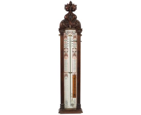 An Edwardian 'Admiral Fitzroy'  pattern barometer in an oak Gothic carved case:, the interior with printed backboard instruct