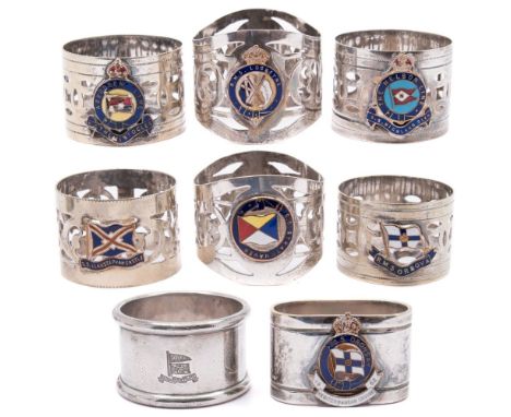 A collection of seven silver plated and enamel shipping line napkin rings together with a plain example:, comprising;SS Strat